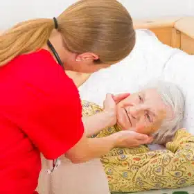 senior with caregiver